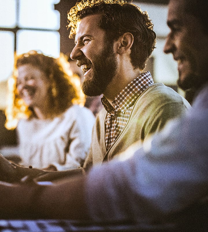 People engaged in a lively group conversation